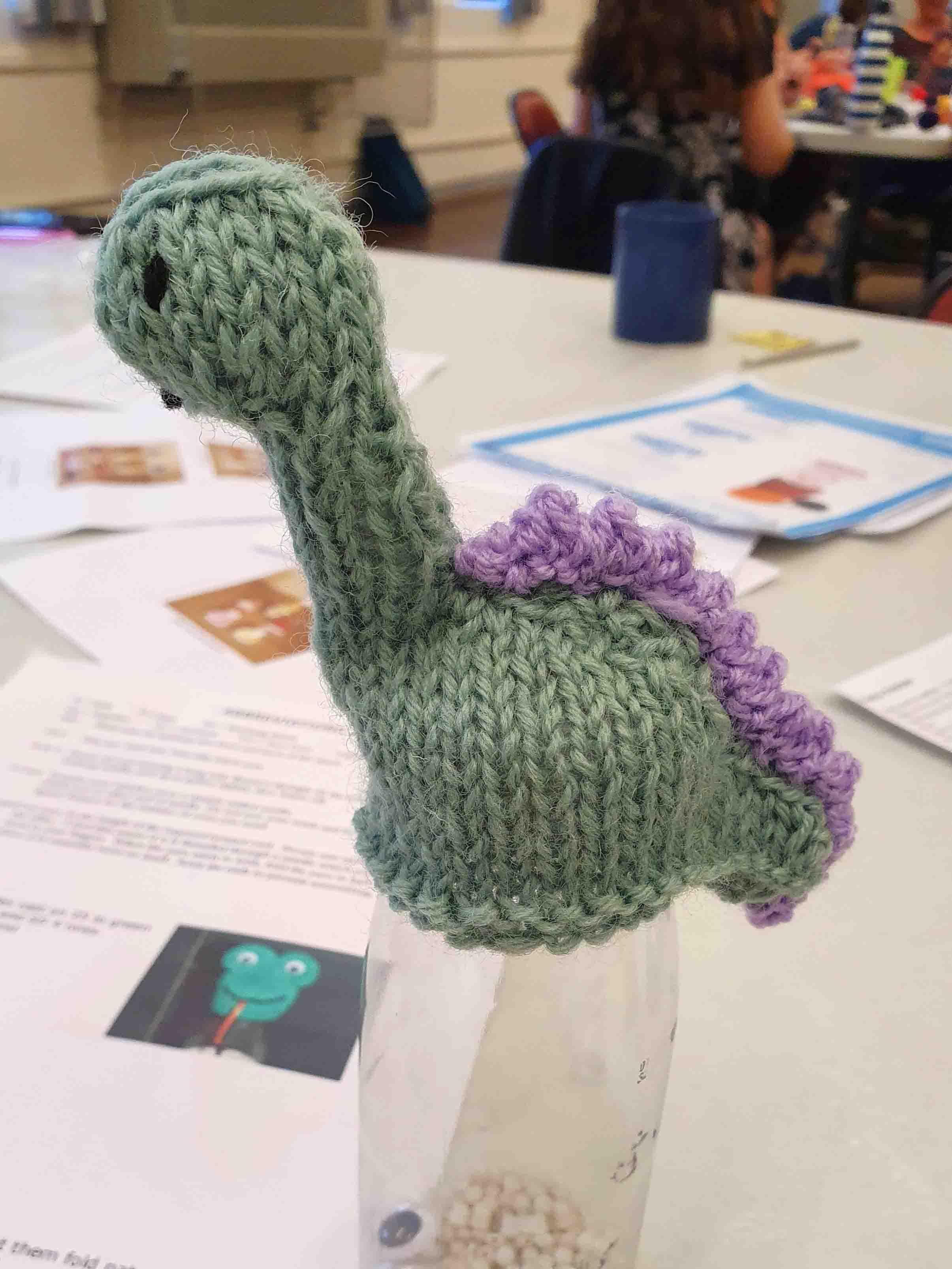 Dinosaur shaped little knitted hat