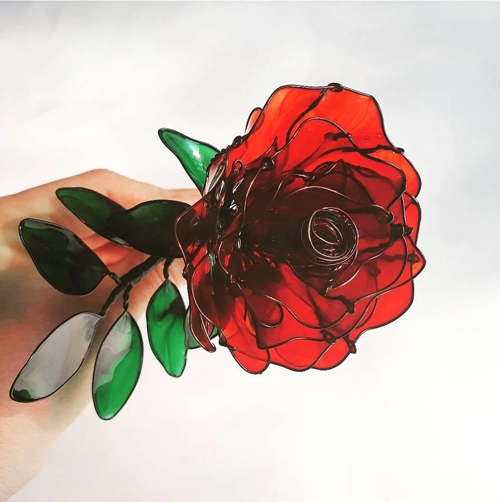 A glass red rose